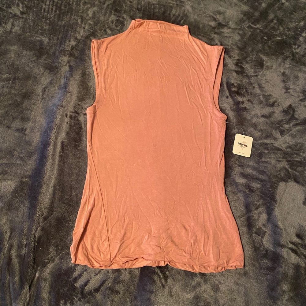 Sleeveless mock neck top